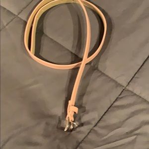 Never worn! Light pink vinyl belt